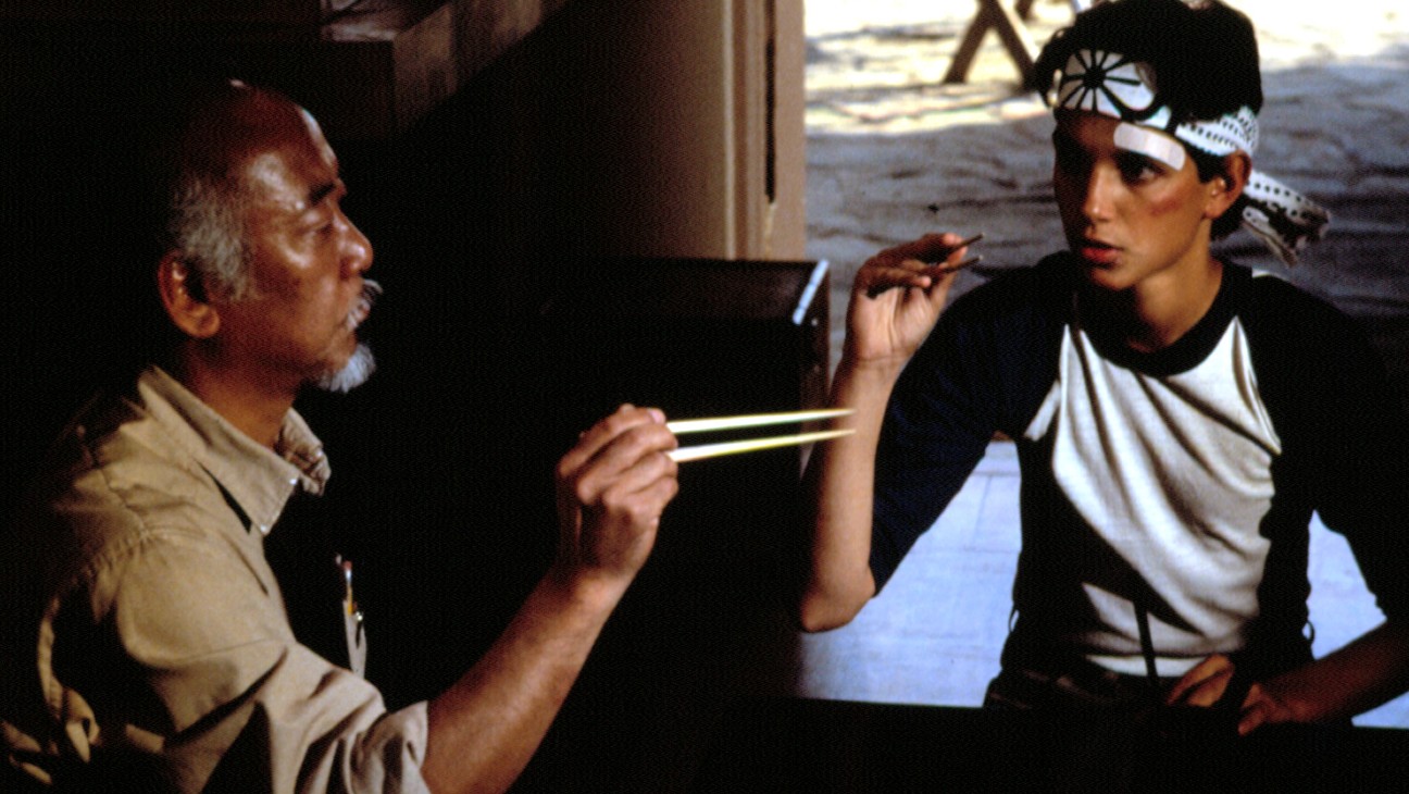 Pat Morita and Ralph Macchio in The Karate Kid